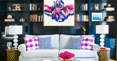 abstract artwork purple persian rug built in bookshelves dark blue how to hang artwork in your home indigo family living room space design shop-room-ideas